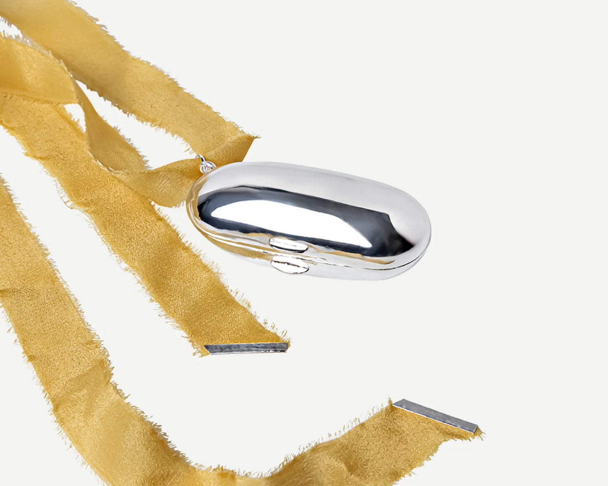 The Silver Keeper  with Saffron Ribbon
