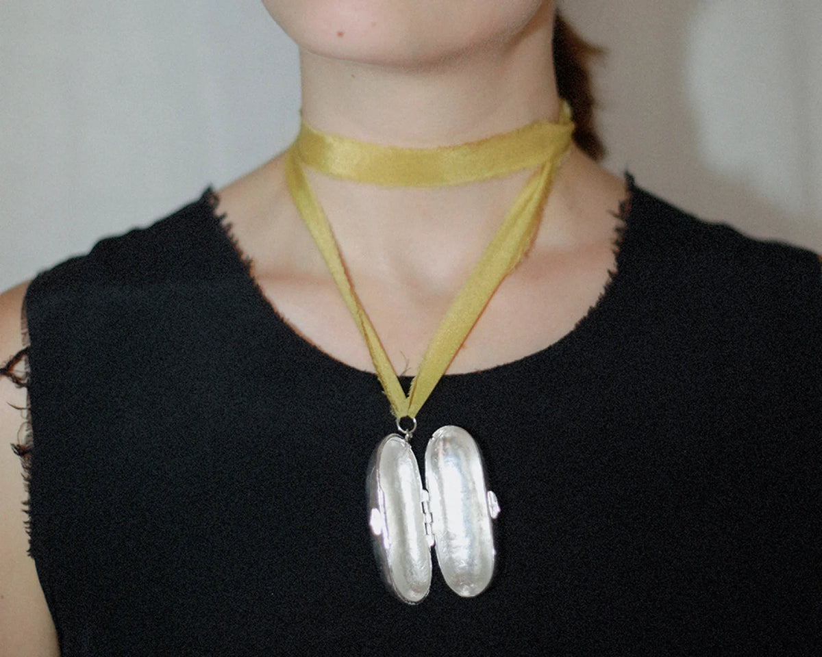 The Silver Keeper  with Saffron Ribbon