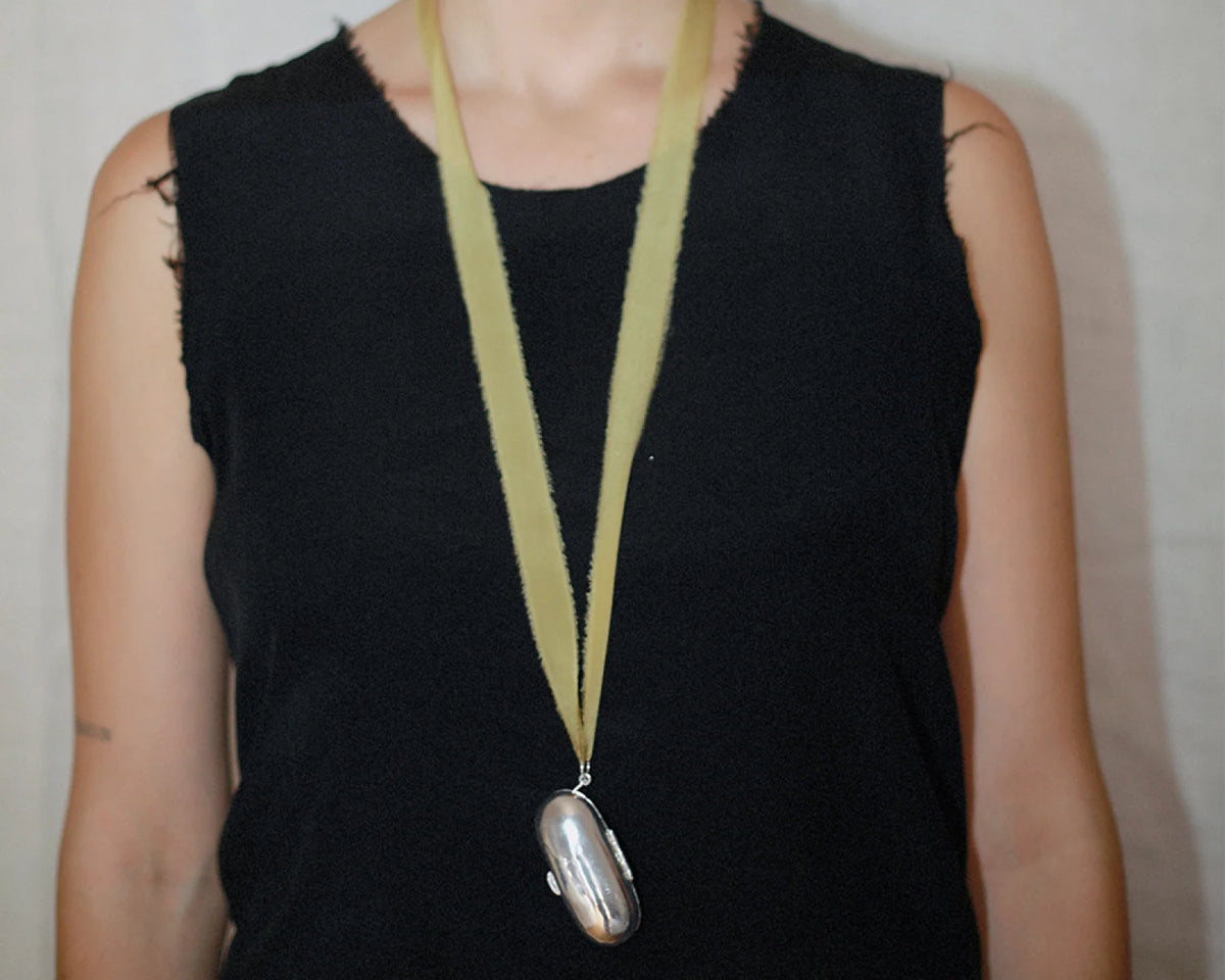 The Silver Keeper  with Saffron Ribbon