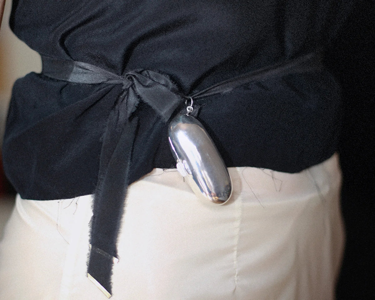 The Silver Keeper  with Saffron Ribbon